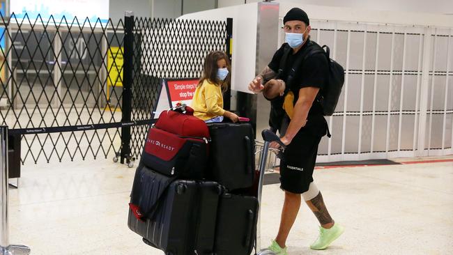 Rugby league star Sonne Bill Williams and his family arrive at Sydney International Airport on July 30, to undergo quarantine for two weeks before joining the Sydney Roosters for the remainder of the 2020 NRL season. Picture: Don Arnold/Getty