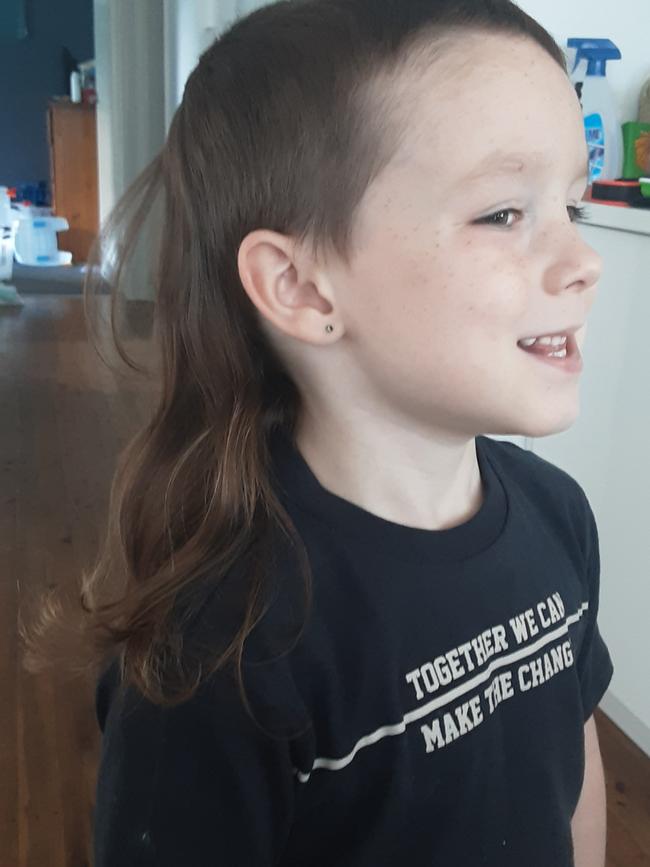 Ryan, aged four, is proud of his mane which came from his fear of the barber.