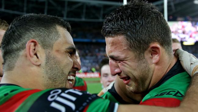 Sam Burgess and Greg Inglis celebrate winning the 2014 grand final with Souths.