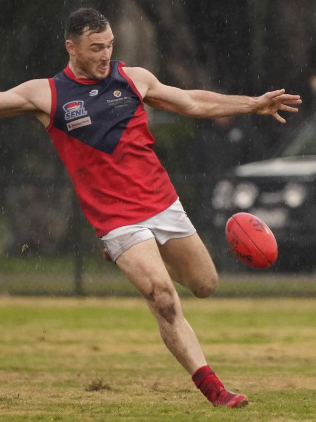 SFNL: Luke Tapscott gets a kick for Chelsea Heights. Picture: Valeriu Campan