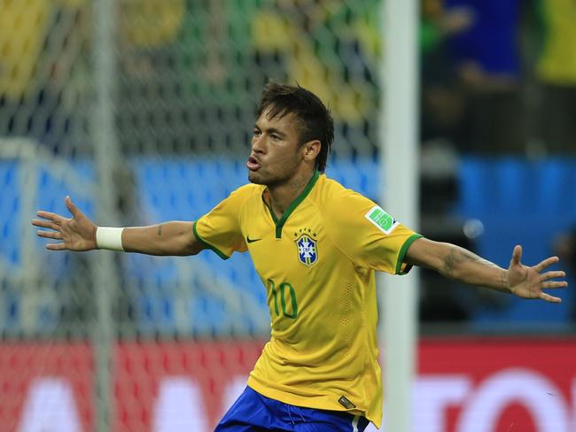 Brazilian forward Neymar celebrates scoring during game one of the 2014 FIFA World Cup. Picture: AFP/Adrian Dennis