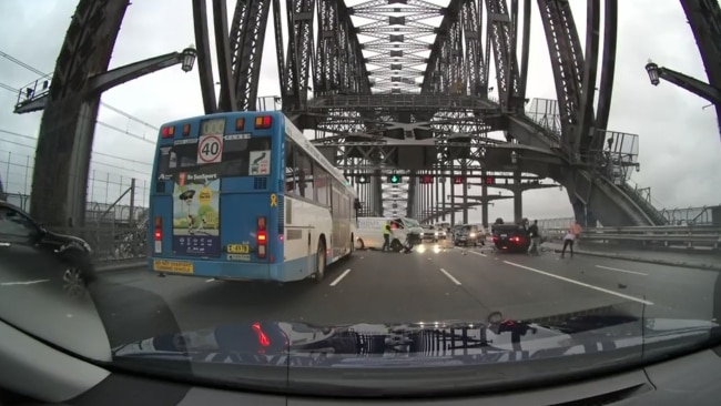 Dashcam footage captured the moment an horrific head-on crash unfolded on the Sydney Harbour Bridge on Monday morning, before a car exploded into flames. Picture: Facebook