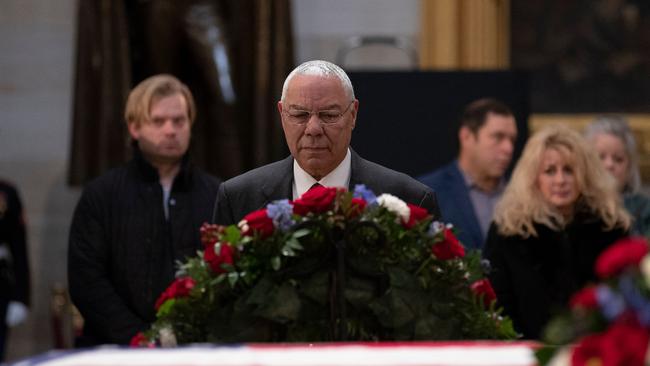 Colin Powell pays his respects as the remains of former US President George H. W. Bush lie in state at the US Capitol rotunda in Washington. Picture: AFP.