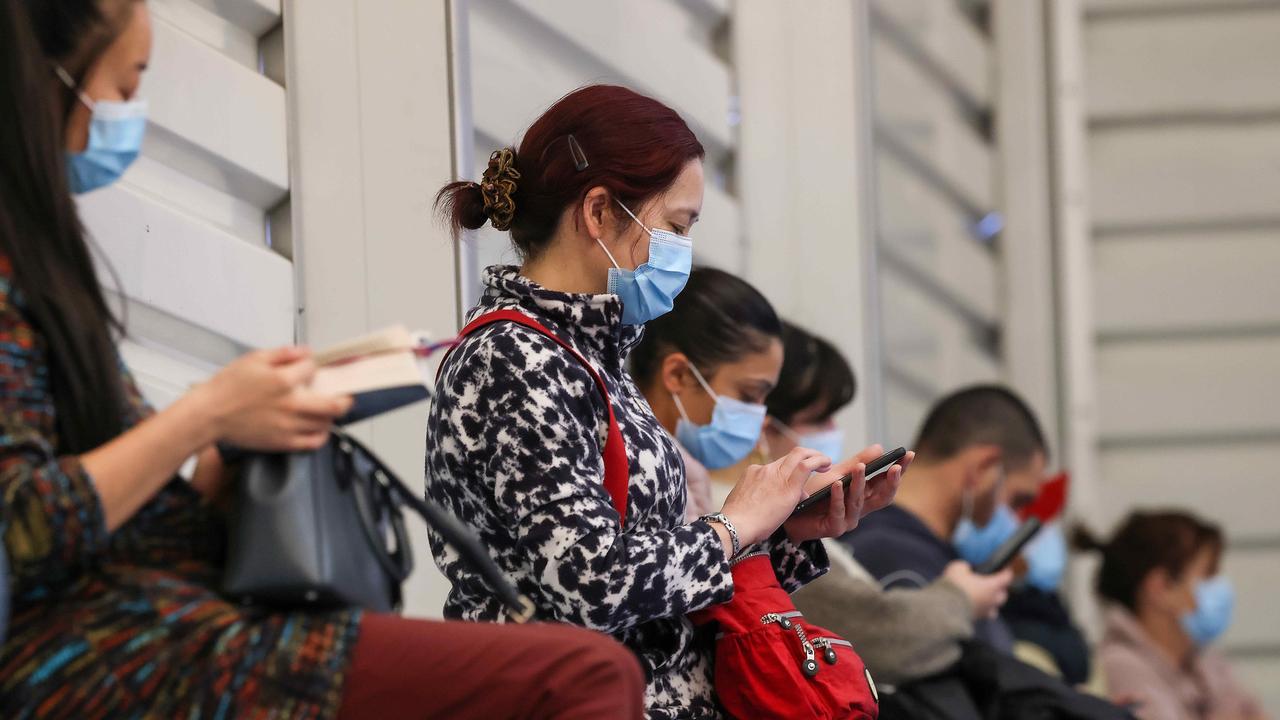 Aged care and disability care workers line up for their vaccine at the Melbourne Showgrounds as Melbourne endures a fourth lockdown due to a Covid-19 South Australian hotel quarantine leak. Picture: NCA NewsWire / Ian Currie