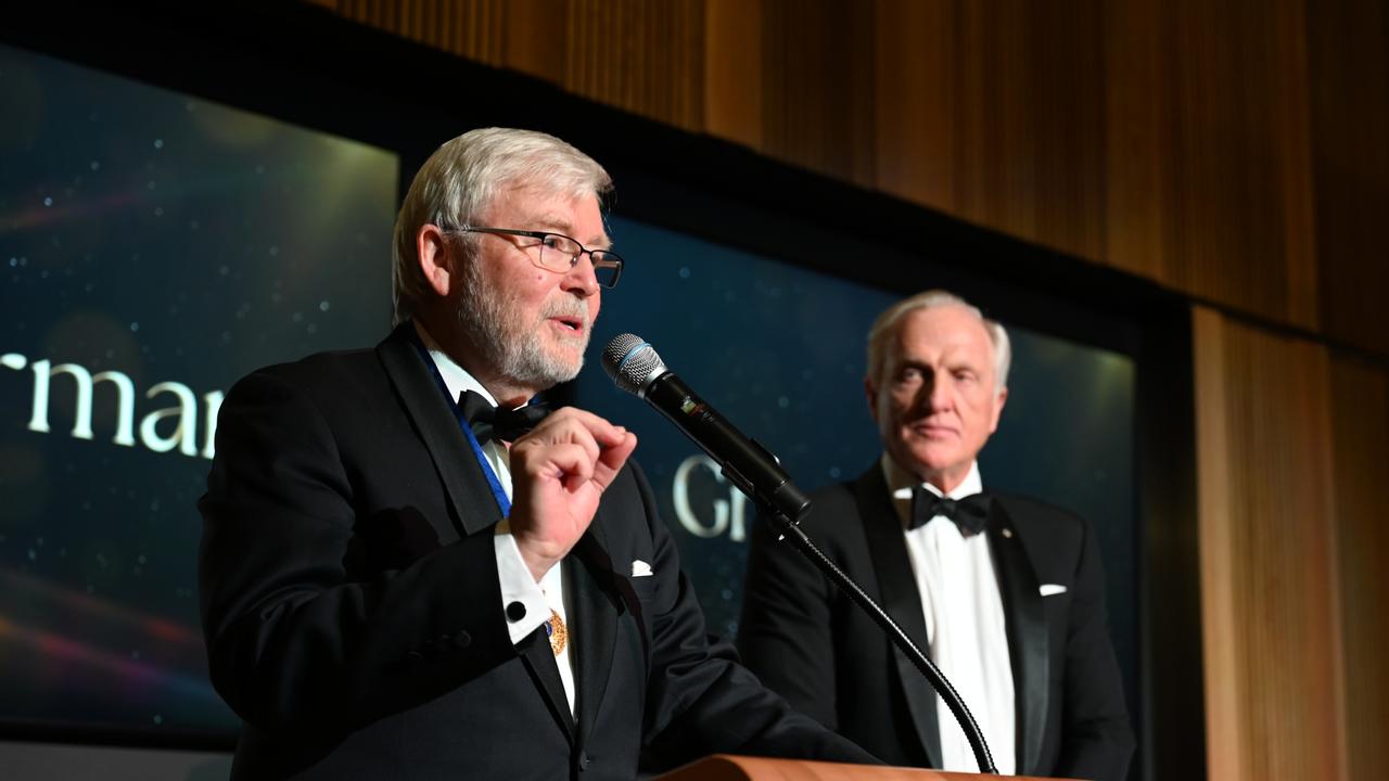 Greg Norman receives an award from Kevin Rudd at the Australia Day gala in Washington DC. SUPPLIED