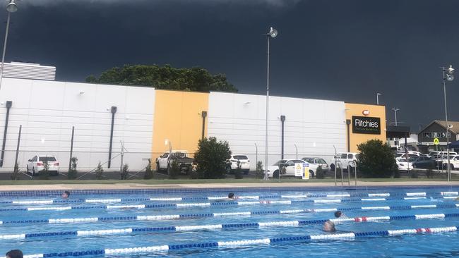 The Maclean Pool as a large storm builds overhead.