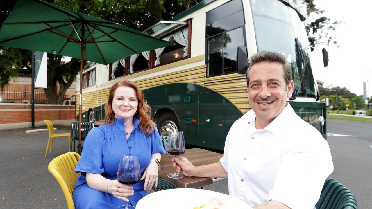 Sarah and Biagio Biuso alongside their new fine dining restaurant in a converted bus, Da Biuso, parked at Eagle Farm Racecourse in Ascot. Picture: Steve Pohlner