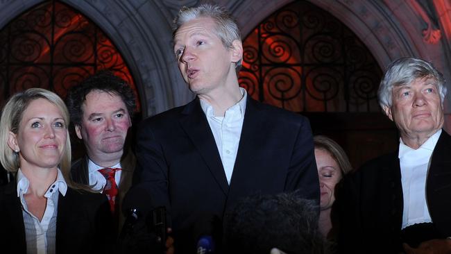 Wikileaks founder Julian Assange came to stay with me after my then husband, Geoffrey Robertson (far right), became part of his legal team. Picture: AFP/Adrian Dennis 