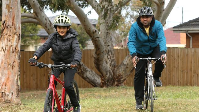 Shiv Iyer and father Subu love to bike ride together. Picture: Hamish Blair