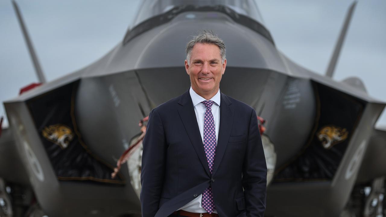 Deputy PM and Defence Minister Richard Marles with a F-35A fighter jet. Picture: David Caird