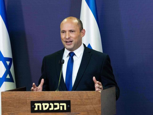 Leader of the Yemina party, Naftali Bennett, delivers a political statement in the Knesset ,the Israeli Parliament, in Jerusalem, Israel, 30 May 2021. (Photo by YONATAN SINDEL  /POOL / FLASH 90 LOCAL  POOL / AFP)