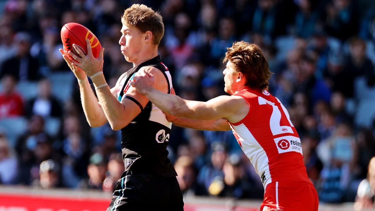 Todd Marshall beats Dane Rampe on the lead. Picture: James Elsby/AFL Photos via Getty Images