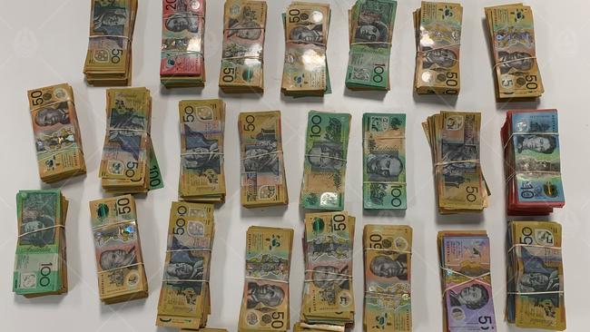 NT Police alleged they found 1.3kg of MDMA, 130g of ketamine, 19.5g of LSD, $275,760 in cash, six mobile phones, and “other items indicative of drug supply” in a Driver home. Picture: PFES