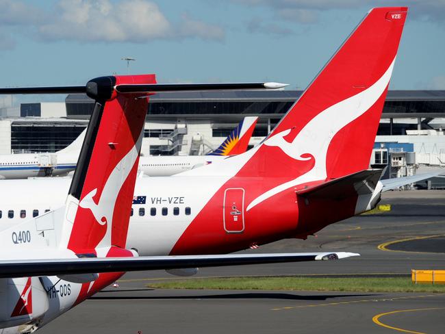 Qantas aircraft seen at Sydney International Airport, Sydney, Friday, April 7, 2017. (AAP Image/Joel Carrett) NO ARCHIVING
