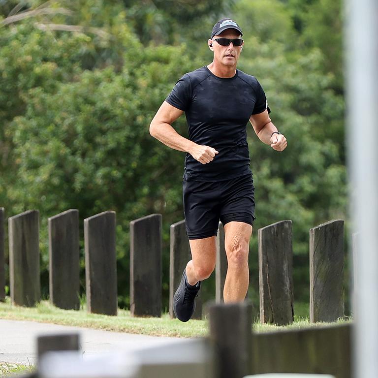 Stood-down cop Senior Sergeant Arron Ottaway out jogging on the Gold Coast after facing disciplinary action over a police pursuit. Picture: Nigel Hallett