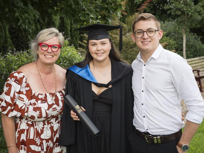 Bachelor of Science graduate Danika Richardson is congratulated by Kylie Sengstock and Luke Bidgood at a UniSQ graduation ceremony at Empire Theatres, Tuesday, February 13, 2024. Picture: Kevin Farmer