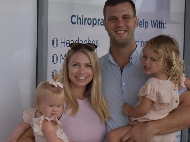 Dr George Hannaford with his wife Amanda and two daughters Matilda (2) and Eloise (11 months) at the new office for Spinal care along Shakespeare street