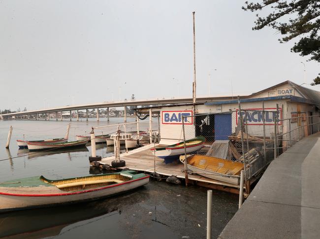 The fleet of boats sit in very shallow water. Picture: Sue Graham