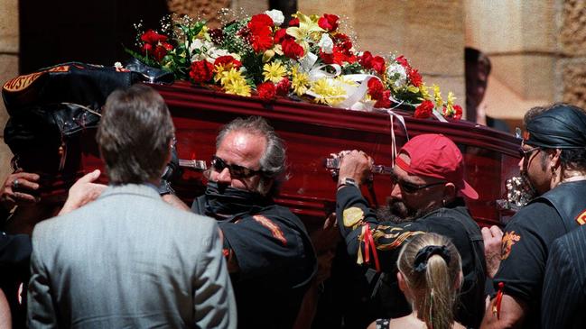 Bandidos members carry slain leader Michael Kulakowski's after he was killed in the Black Market ambush in 1997.