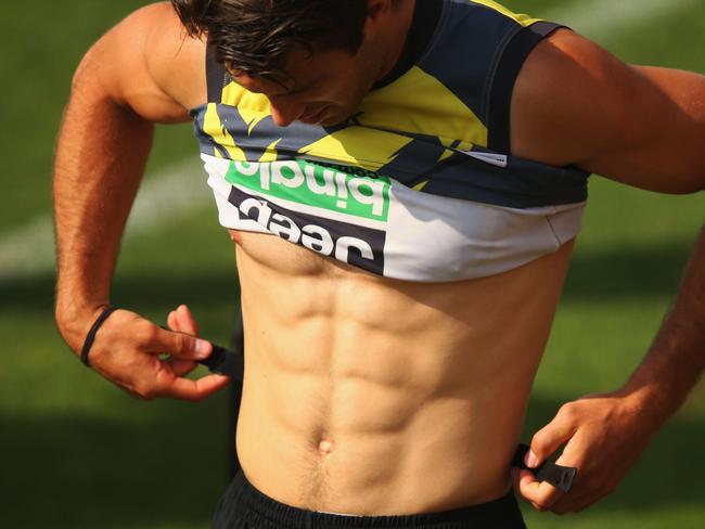 Alex Rance of the Tigers shows off his six pack. Picture: Michael Dodge/Getty Images