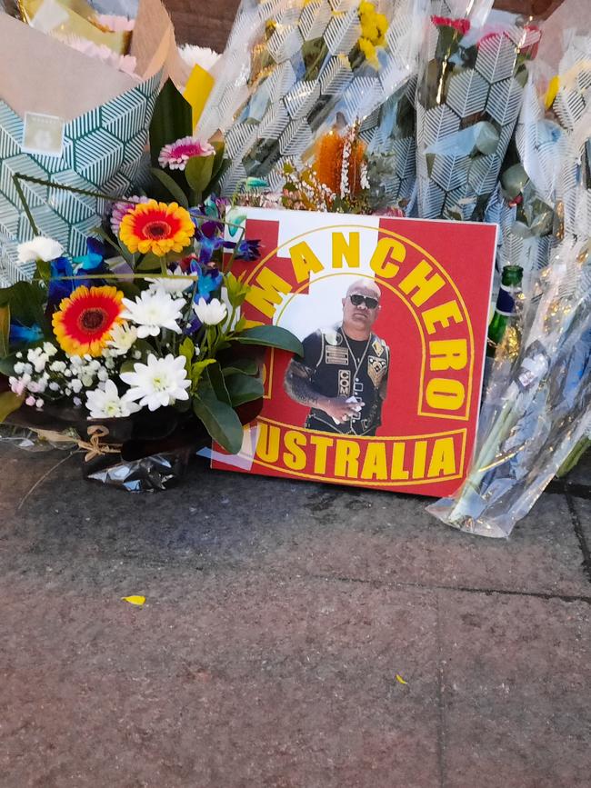 Flowers at the scene of the killing of Canberra Comanchero boss Pitasoni Ulavalu. Picture: Craig Dunlop