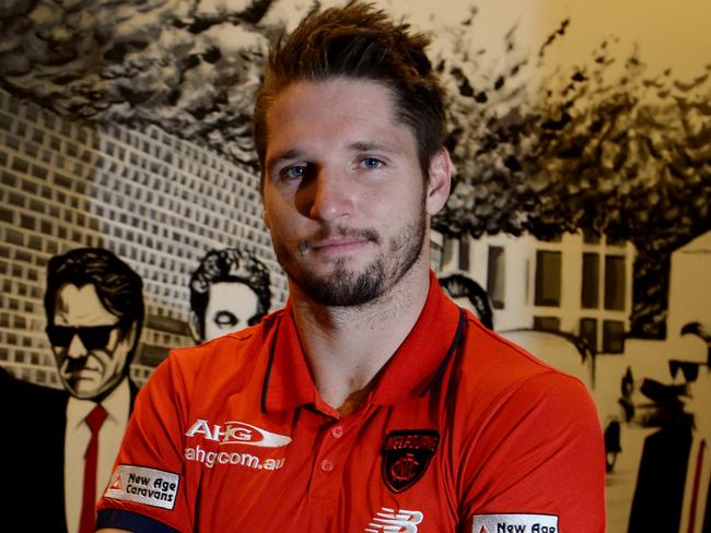 Melbourne Demon Jesse Hogan is re-signing with Melbourne until the end of 2019 season. pictured is Jesse during a press conference in Perth