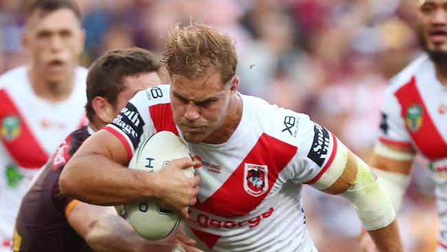 De Belin battled through the pain against the Broncos. Photo by Chris Hyde/Getty Images.