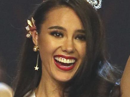 Newly crowned 2019 Miss Universe Catriona Gray, of Philippines, waves during the final of 67th Miss Universe competition in Bangkok, Thailand, Monday, Dec. 17, 2018.(AP Photo/Gemunu Amarasinghe)