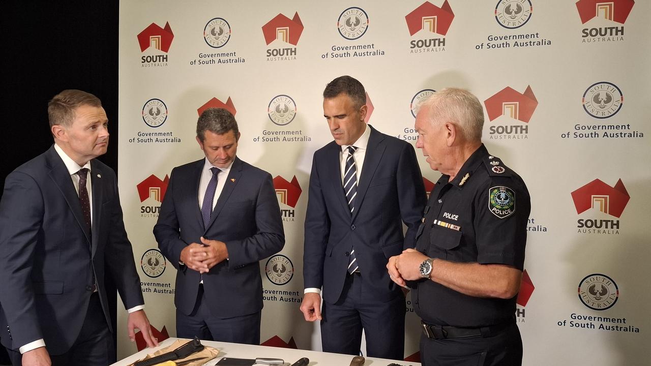 Caption: Premier Peter Malinauskas, Attorney General Kyam Maher, Treasurer of South Australia Stephen Mullighan and Police commissioner Grant Stevens discussing the proposed new laws to tackle knife crime, set to be introduced to parliament this week.