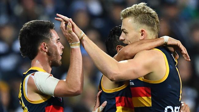 Lachlan Murphy and Hugh Greenwood celebrate a goal for Adelaide this season. Picture: Quinn Rooney (Getty).