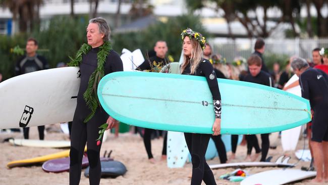 GOLD COAST, AUSTRALIA - JULY 11: Alex Pullin's father and girlfriend Ellidy Vlug head out to sea to pay respects in memory of Alex 'Chumpy' Pullin on July 11, 2020 in Gold Coast, Australia. Australian Winter Olympic Games Snowboarder Alex 'Chumpy' Pullin died on Wednesday 8 July in a drowning accident while spearfishing at Palm Beach on the Gold Coast, aged 32. (Photo by Chris Hyde/Getty Images)