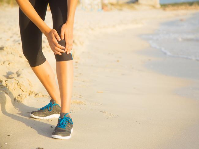 young jogger has knee pain