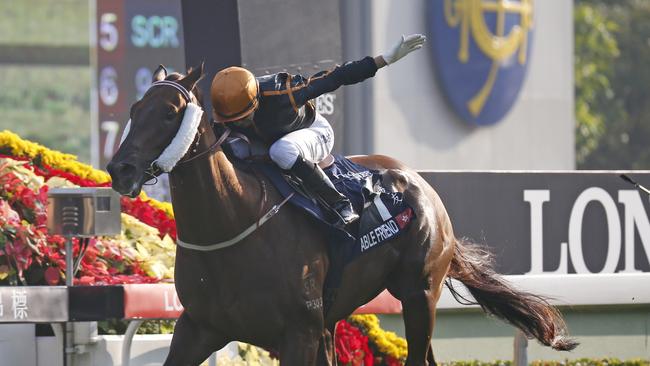 Brazilian jockey Joao Moreira, riding Hong Kong horse Able Friend. (AP Photo/Kin Cheung)