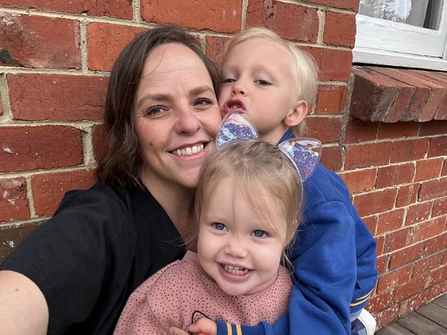 Former RDH worker Emily Bannister, with children Rune and Dolly, is one of thousands forced to wait months for back-pay owed by the Northern Territory government. Picture: Supplied.