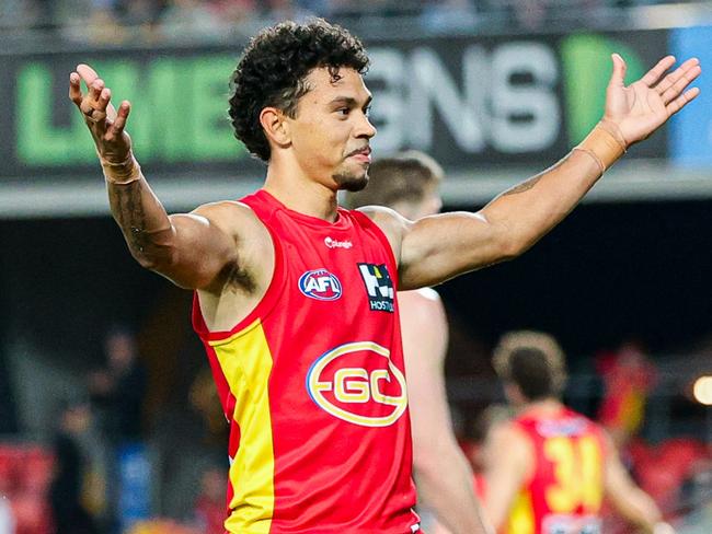 GOLD COAST, AUSTRALIA - JUNE 25: Malcolm Rosas of the Suns celebrates a goal during the 2023 AFL Round 15 match between the Gold Coast Suns and the Hawthorn Hawks at Heritage Bank Stadium on June 25, 2023 in the Gold Coast, Australia. (Photo by Russell Freeman/AFL Photos via Getty Images)