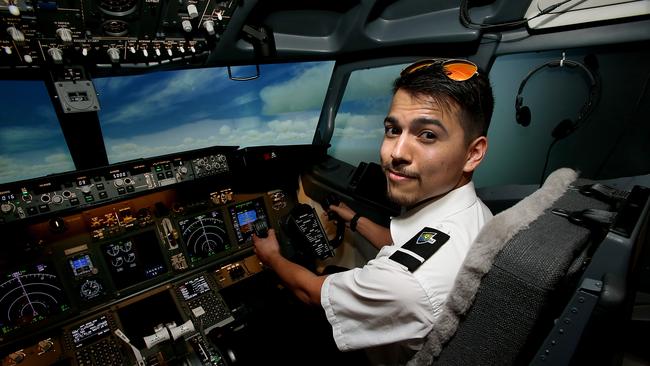 CQUniversity aviation student Taylor Sammut on flight simulator at the Cairns Aviation Centre at the Cairns Airport. PICTURE: STEWART MCLEAN