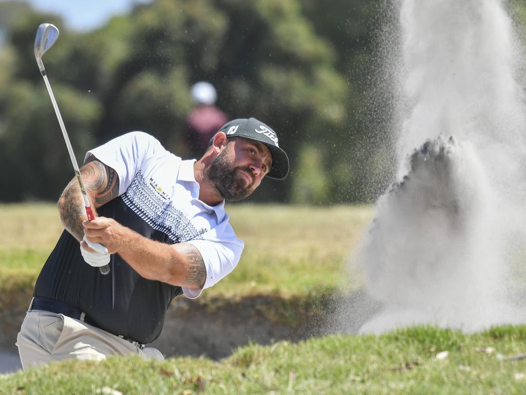 Ryan Peake survived a tough dayin the wind to secure the halfway lead at the Sandbelt Invitational. Photo: Paul Shire