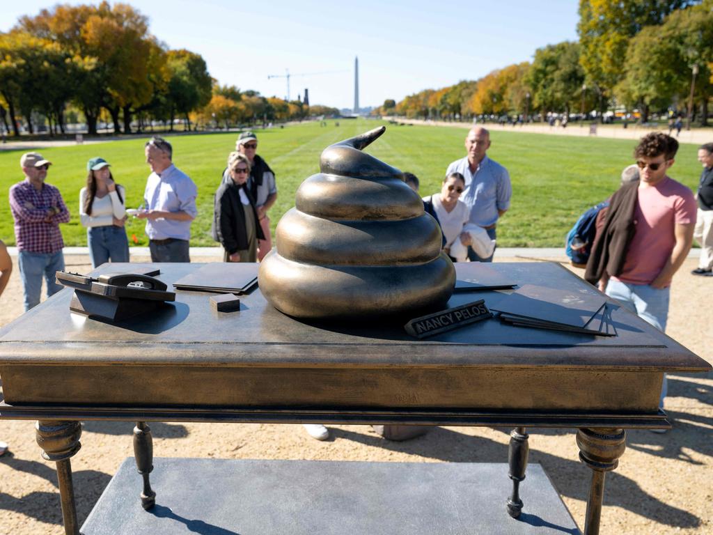 A bronze art installation depicting a pile of poo on former US Speaker of the House Nancy Pelosi's desk by the group Civic Crafting to protest remarks by Donald Trump honoring the January 6, 2021 attack on the US Capitol, on the National Mall near the US Capitol in Washington, DC. Picture: AFP