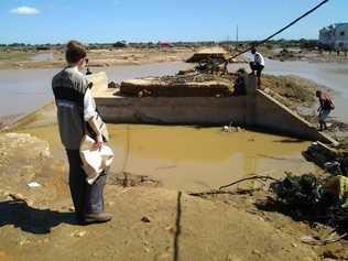 Yolanda assessing damage from Tropical Cyclone Haruna in Madagascar in 2013