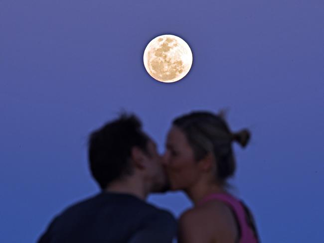 Supermoon above Townsville from Castle Hill where Josh Cinner and Michele Barnes kissed in front of it. Picture: Zak Simmonds