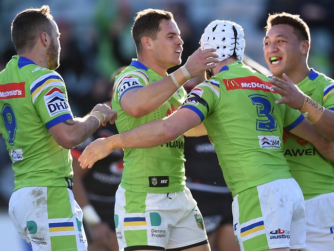 Jarrod Croker of the Raiders, (centre), celebrates with team mates after scoring a try during the round 20 NRL match between the Canberra Raiders and the New Zealand Warriors at GIO Stadium in Canberra, Saturday, July 23, 2016. (AAP Image/Dan Himbrechts) NO ARCHIVING, EDITORIAL USE ONLY