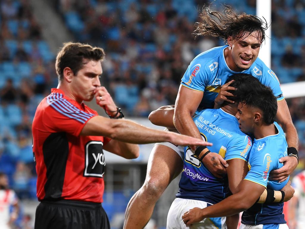 Alofiana Khan-Pereira of the Titans celebrates with his teammates after scoring a try. Picture: Getty Images