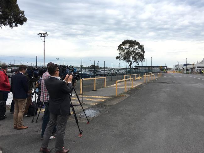 Ford has pushed the media covering the Broadmeadows factory closure well away from the gates as they wait for workers to exit. Picture: Joshua Dowling/News Corp Australia