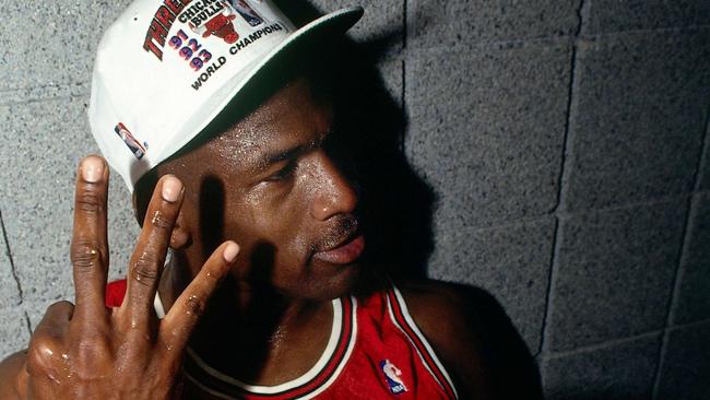 PHOENIX - JUNE 20:  Michael Jordan #23 of the Chicago Bulls celebrates winning the NBA Championship after Game Six of the 1993 NBA Finals on June 20, 1993 at th America West Arena in Phoenix, Arizona.  The Bulls won 99-98.  NOTE TO USER: User expressly acknowledges and agrees that, by downloading and/or using this Photograph, user is consenting to the terms and conditions of the Getty Images License Agreement. Mandatory Copyright Notice: Copyright 1993 NBAE  (Photo by Andrew D. Bernstein/NBAE via Getty Images)