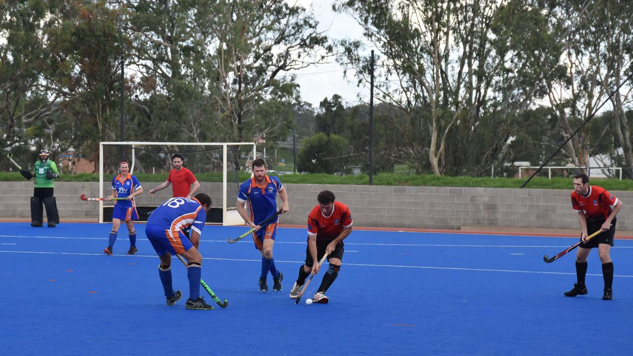 Defender Matthew Hagenbach with the ball against Newtown Tigers.