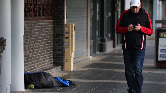 A rough sleeper in Southport in the early hours of the morning. Picture: Glenn Hampson