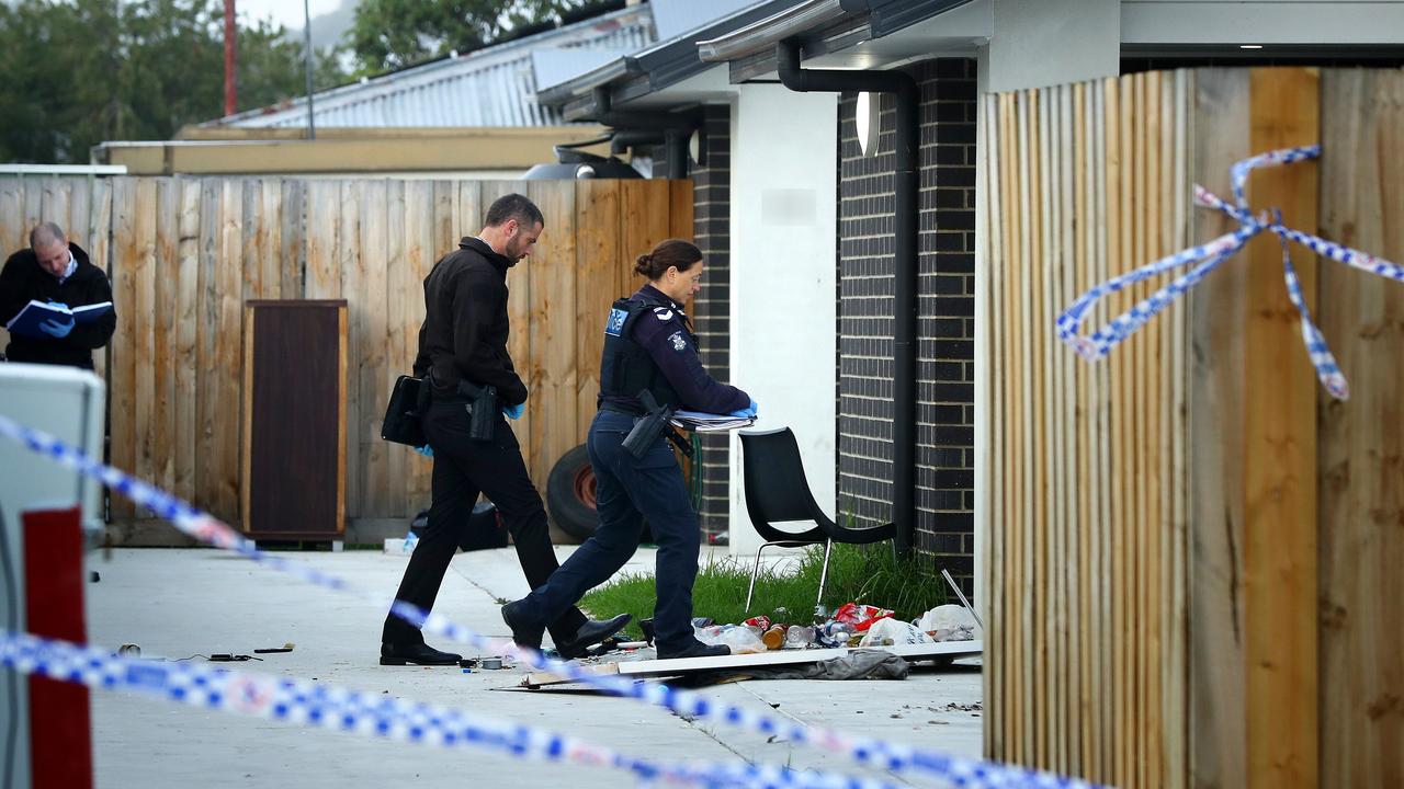 Investigators at a Norlane unit after an incident on Monday night. Picture: Alison Wynd