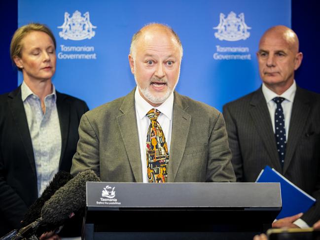 Tasmania’s Director of Public Health Mark Veitch, with Minister for Health Sarah Courtney . and Premier Peter Gutwein, confirms the state’s case of coronavirus. Picture: Richard Jupe