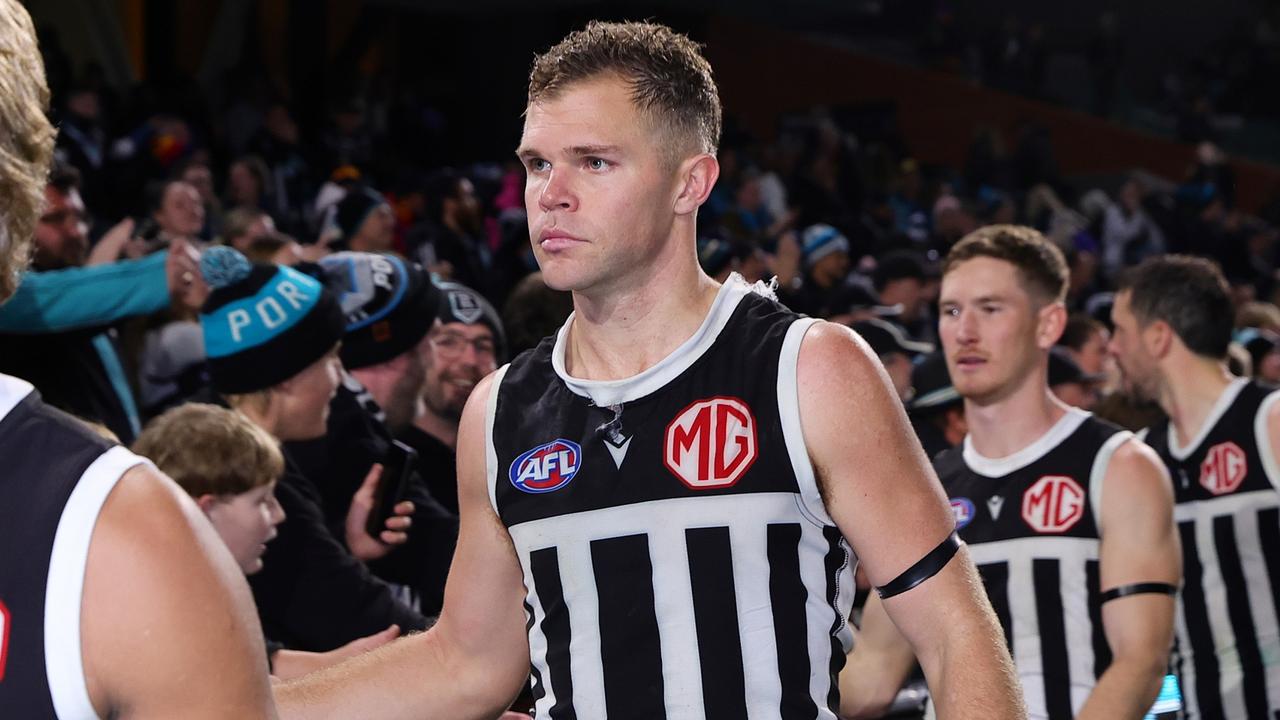 Dan Houston with Port fans for the final time? Photo by Sarah Reed/AFL Photos via Getty Images.