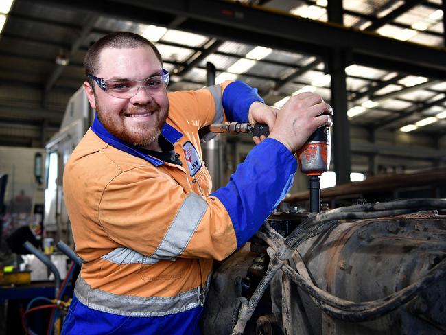 Heavy vehicle diesel technician Aiden Bird works on a truck at CMV Truck Sales and Service. Picture: Bianca De Marchi